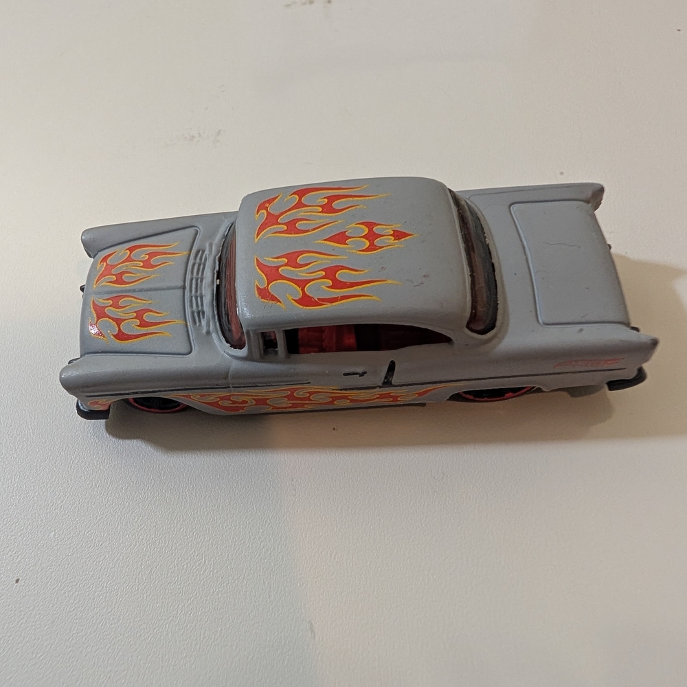 Sleek 1955 Gray Chevy Toy Car with Fiery Flame Design